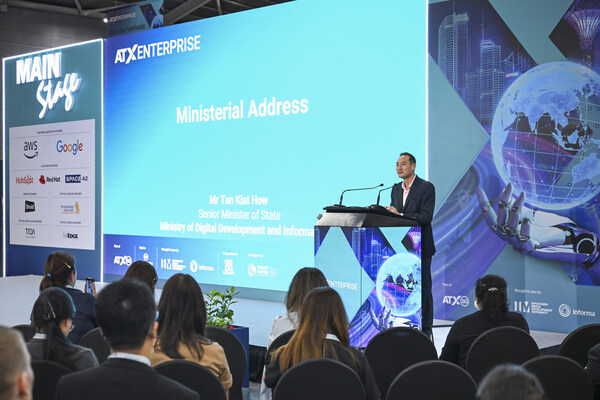 Senior Minister of State, Ministry of Digital Development and Information Mr. Tan Kiat How delivering an address at ATxEnterprise 2026