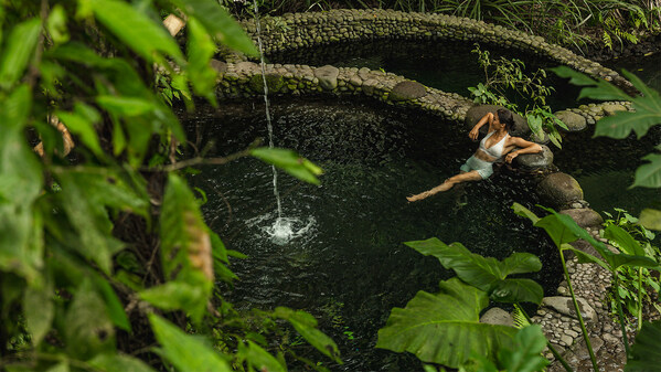 Nestled within a lush forest setting, the Crystal Pool at Bambu Indah offers a serene wellness experience where natural spring water and tranquil surroundings invite deep restoration and connection with nature.