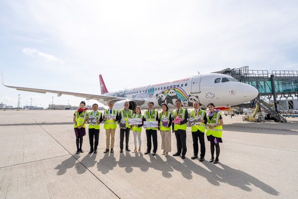(Second from left to second from right) Mr. Wong Tsai-fai, Chief Executive Officer of Ocean Park Corporation; Mr. Paul Pang, Chairman of Ocean Park Corporation; Mr. Liu Chun, Deputy Secretary for Culture, Sports and Tourism; Ms. Rosanna Law, Secretary for Culture, Sports and Tourism; Mr. Liao Chun-sun, Deputy Secretary for Transport and Logistics; Ms. Vivian Cheung, Chief Executive Officer of Airport Authority Hong Kong; Mr. Wang Xiaodong, Chairman of Hong Kong Airlines; and Mr. Sun Jianfeng, President of Hong Kong Airlines, jointly hosted the preview event for the Panda Friends-themed aircraft flight